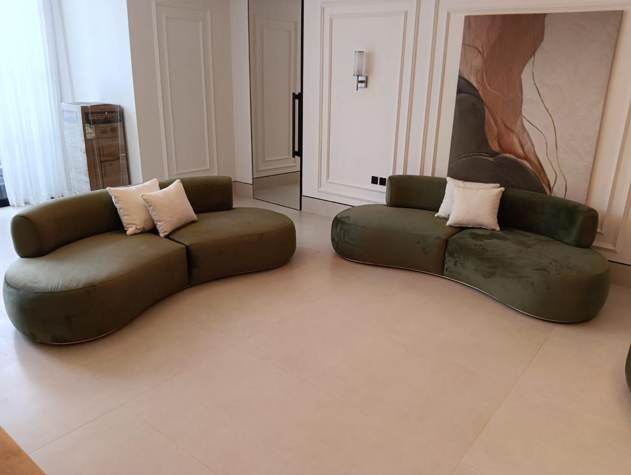 Curved Olive Sofas — Private Villa